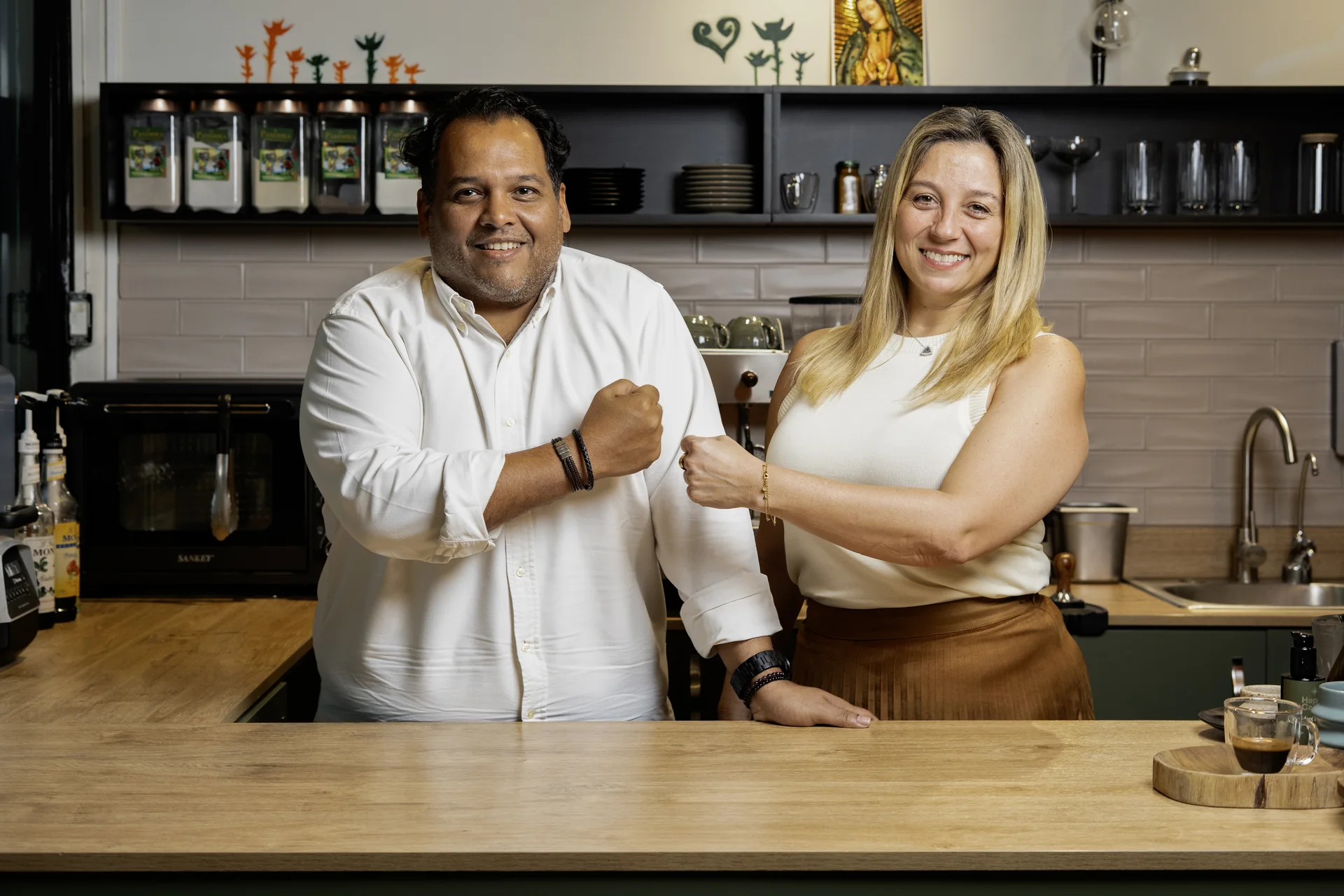 Mario Lozano and Consuelo García at the La Pandora Coffee counter